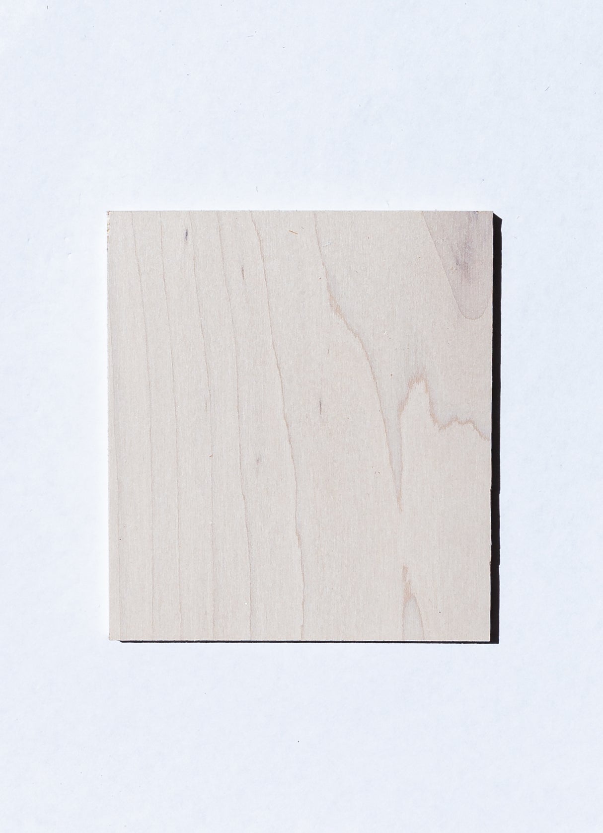 maple wood sample with the pickled white finish applied