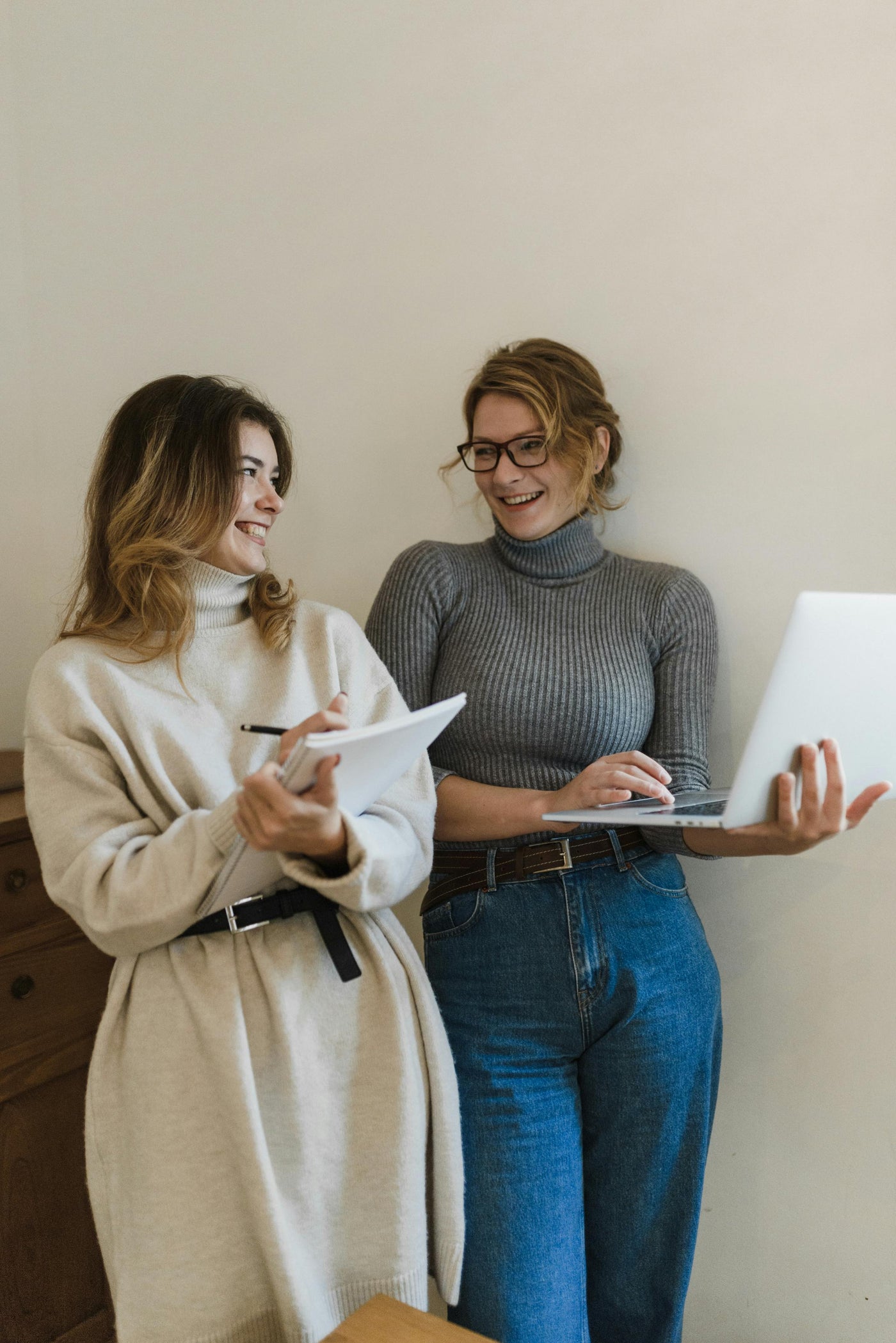 two girls working together