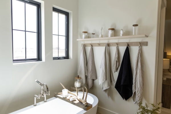 A custom floating shelf in a bathroom