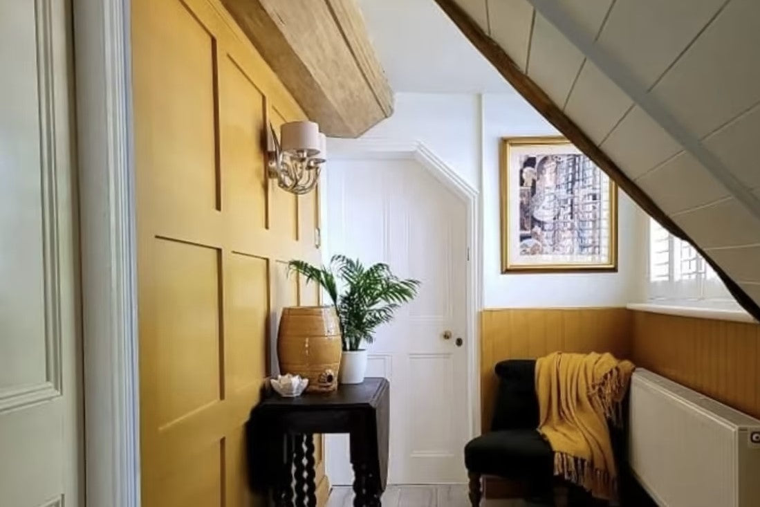A room featuring sunny yellow walls and accents