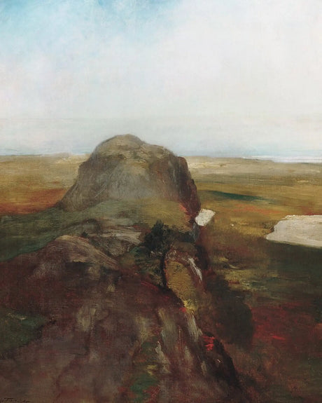 Top of a small hill overlooking barren plains