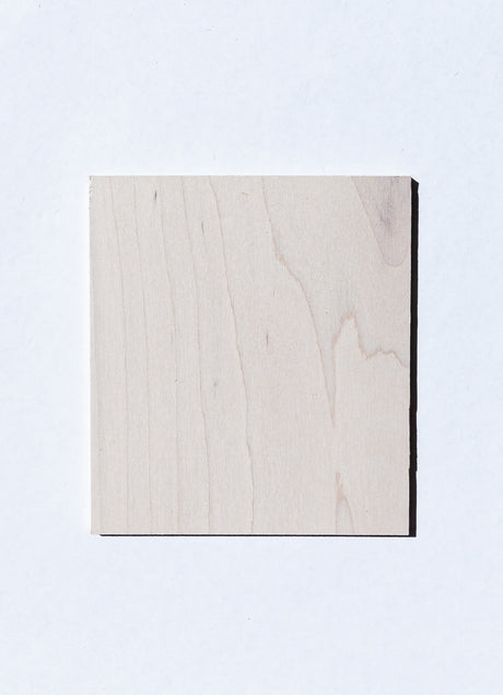 maple wood sample with the pickled white finish applied